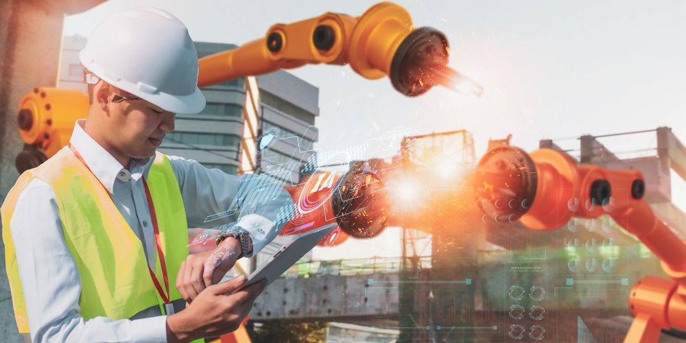 a man with a helmet and a vest in a construction work and behind there is a machine